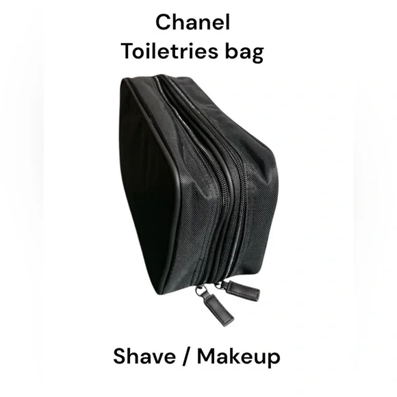 385. Allure Chanel black toiletries zipper bag w box
